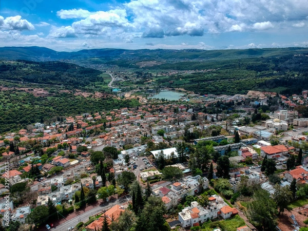 Fototapeta Aerial view of Maalot , Israel with water and communication tower in sight 