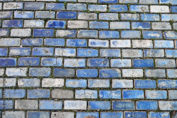 Obraz A pattern of weathers blue bricks from the street of San Juan Puerto Rico