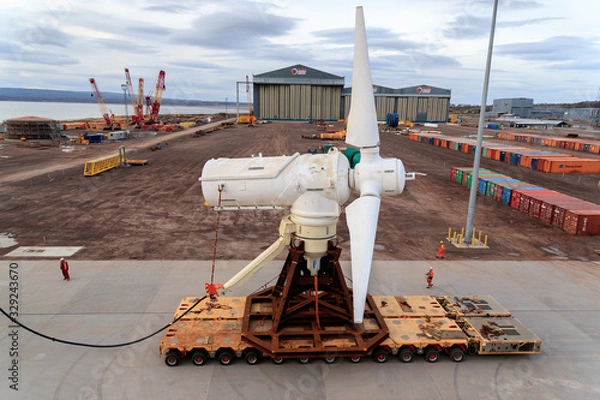 Fototapeta NIGG, SCOTLAND - 2017 MARCH 24. AHH’s 1.5MW tidal turbine being installed at Nigg to capture green energy from ocean currents. 