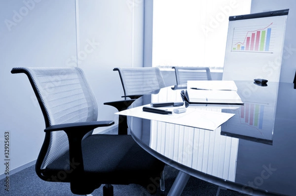 Fototapeta Small meeting room with flip chart