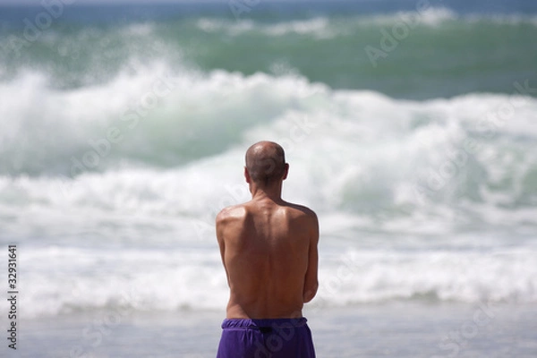 Obraz Homme  face à l'océan.