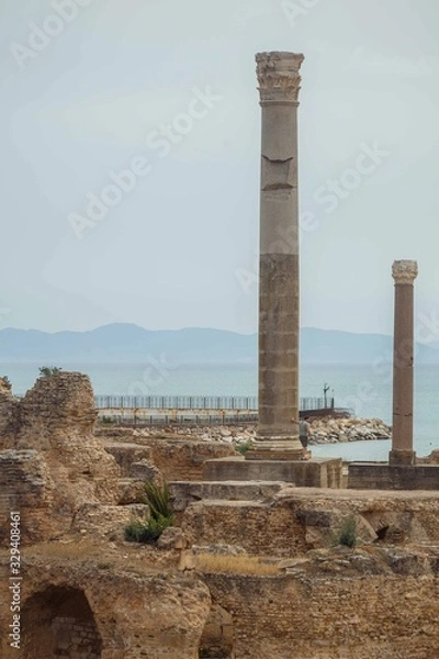Obraz Columns on the ruins of Antonine Baths at the archaeological site in Carthage, Tunisia