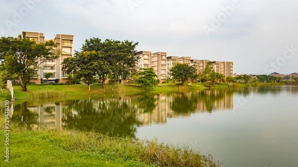 Obraz Tangerang, Indonesia - 7th June 2019: Rainbow Springs Condo Villa, a luxury apartment complex, next to a lake, in Gading Serpong residential area. It is an area with high property development.