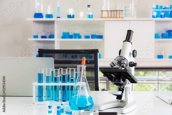 Fototapeta Corona virus, or Covid-19, is spreading all over the world.Asian girls scientist works in modern biological lab, Covid-19 is currently trying to find a drug against the virus to treat the infected.