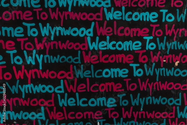 Obraz Exploring artful graffitis in the hipster district Wynwood in Miami with its Wynwood Walls (Miami, Florida, USA) 