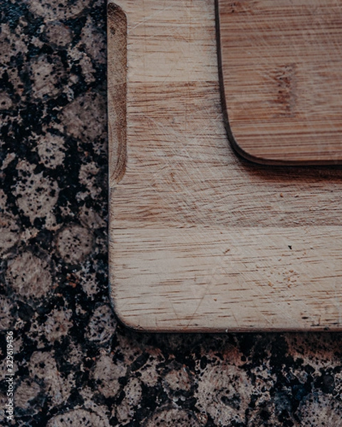 Fototapeta cutting boards on top of kitchen marble 