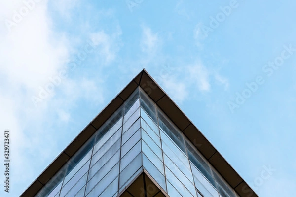 Fototapeta Bottom UP View Of A Corporate Building Against The Blue Sky