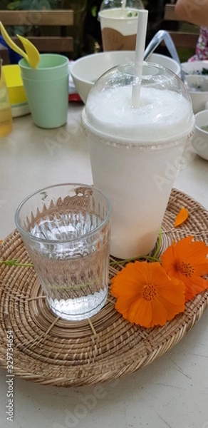 Obraz Closeup of pure water and cold milk blurred background.  Drinks for health concept.