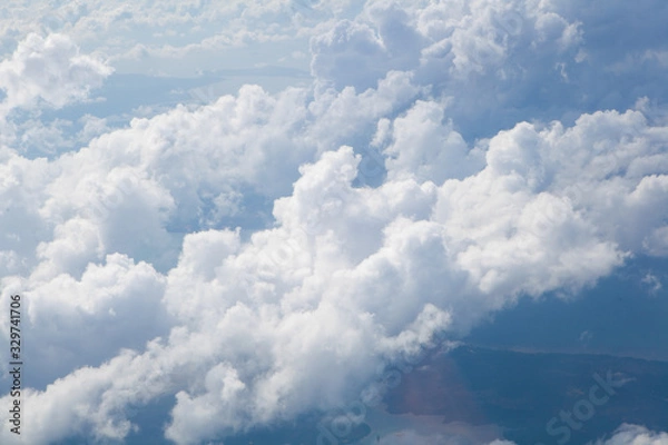 Obraz blue sky with white clouds