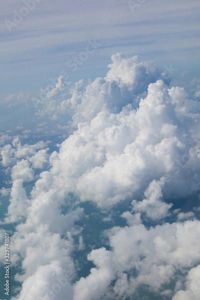 Obraz blue sky with white clouds