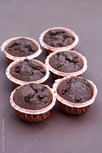 Obraz chocolate muffins on a dark background