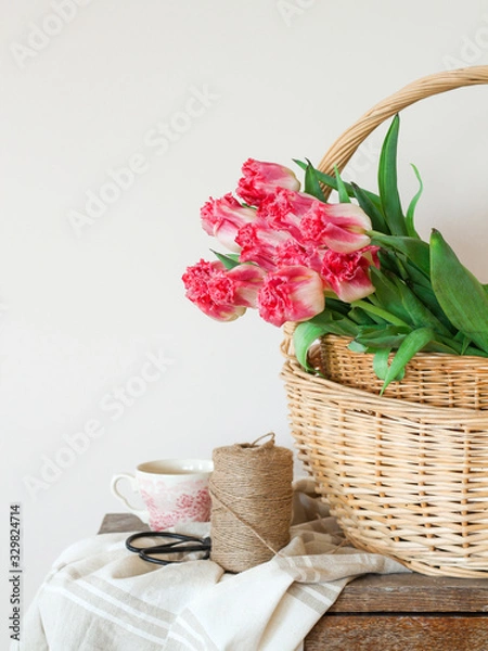 Obraz Spring composition with pink tulips in a basket
