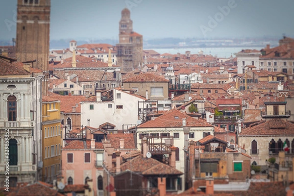 Fototapeta Tilt shift effect of Venice houses roofs, Italy