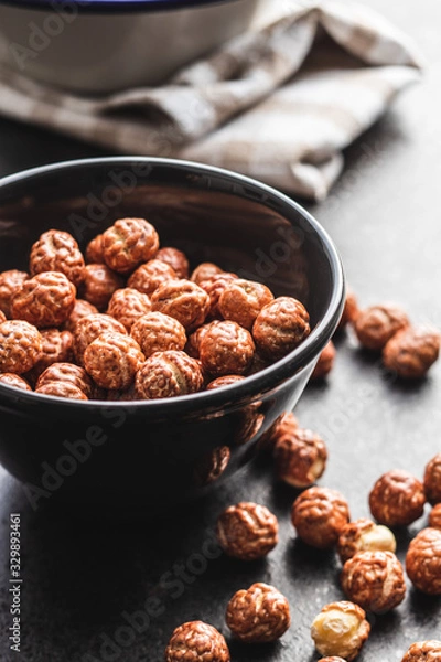 Fototapeta Hazelnuts with sugar icing.
