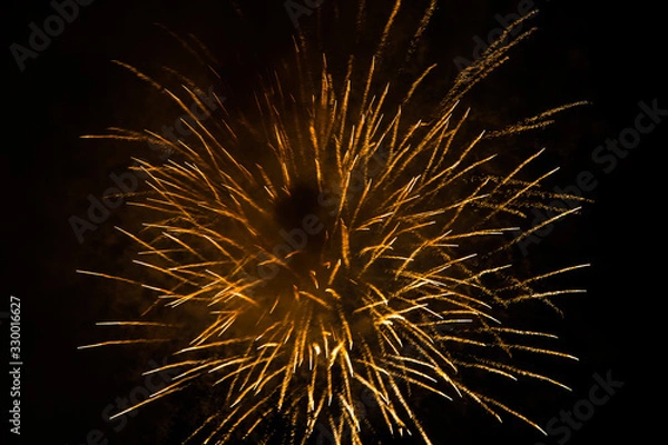 Obraz Yellow firecracker in the dark sky