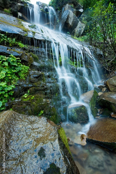 Fototapeta Scenic waterfall in the green Carpathian mountains