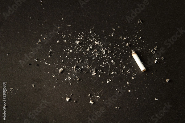 Obraz cigarette butt, on a black background