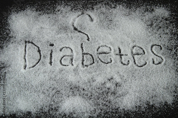 Obraz Sugar description in black. the word diabetes on a black background with a question mark