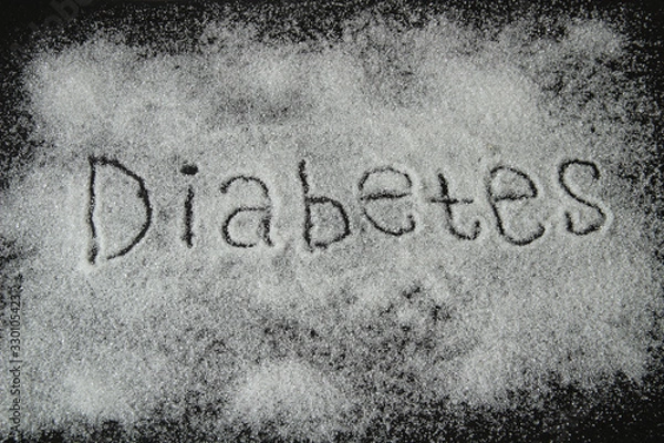 Obraz diabetes, sugar, the text is written on a black background with sugar