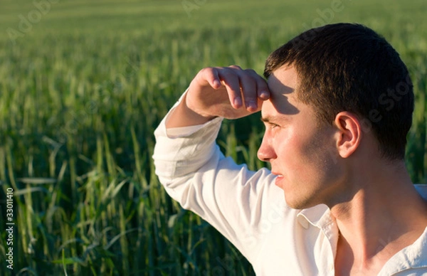 Obraz Young man in field
