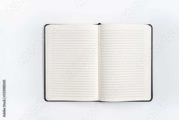 Obraz black notebook on white background with clipping path