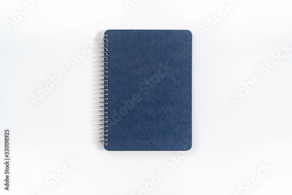Obraz Dark blank blue notebook closed in closeup