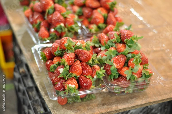 Obraz close up fresh strawberry in packing box