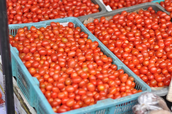 Obraz Close up mini tomato in basket