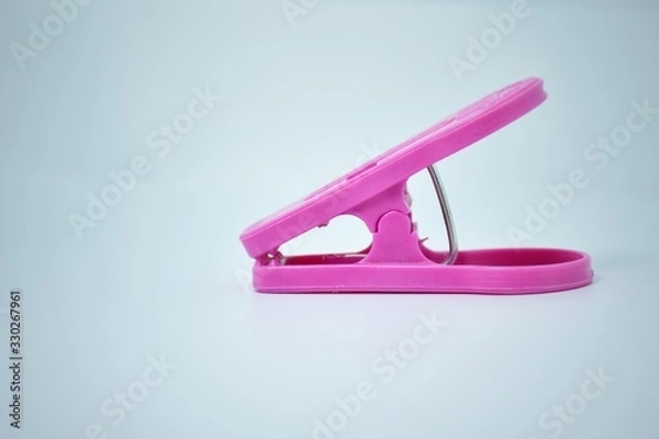 Fototapeta red stapler isolated on white background