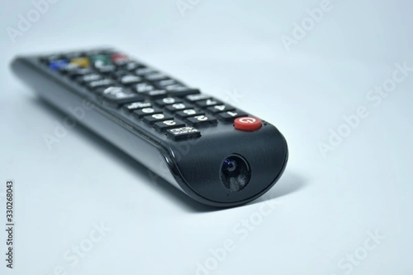 Fototapeta tv remote control isolated on white background