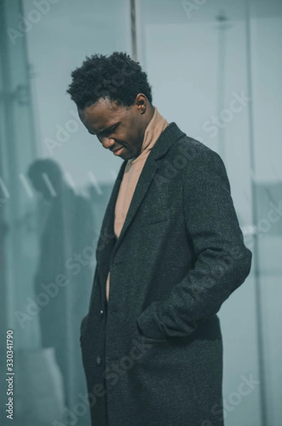 Obraz portrait of a elegant man near to a building