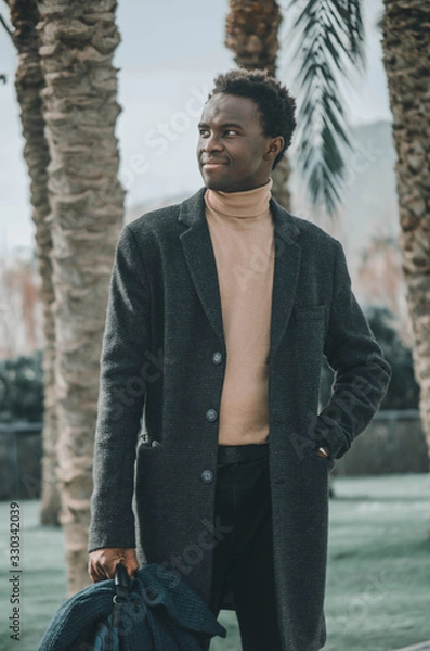Obraz portrait of a black businessman looking to the horizon