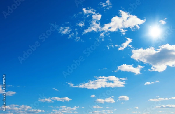 Fototapeta Blue sky with clouds and sun.