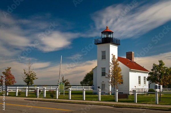 Fototapeta Afternoon light on Sand Point lighthouse on Lake Michigan, Escanaba, Michigan.