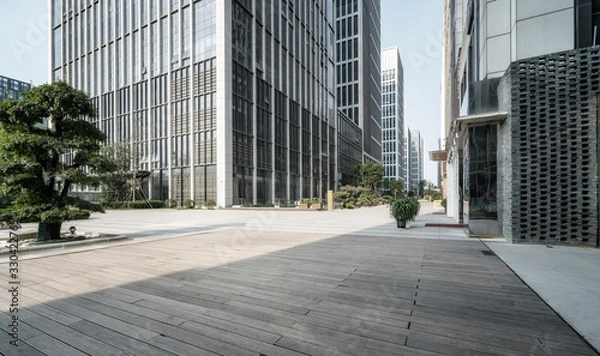 Fototapeta Square and office building of Jinan central business district..