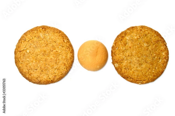 Obraz Apple and sponge cookies in a line
