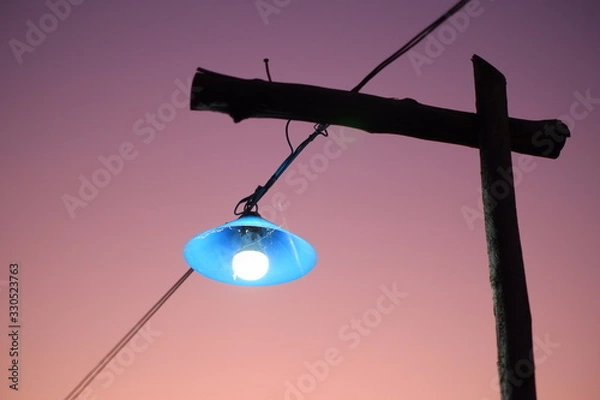 Obraz lamppost in rural feel sunset