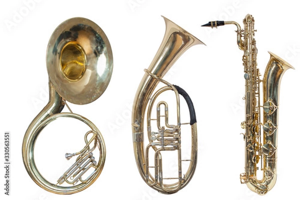 Fototapeta set of three wind musical instruments, classic wind instrument sousaphone, classic wind musical instrument saxophone and baritone Euphonium, isolated on a white background