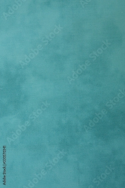 Fototapeta  turquoise or aqua menthe blue marble fabric background with space for text or image. Pattern, texture, background. Vertical photo.