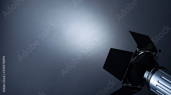 Fototapeta Spotlight shining on grey background