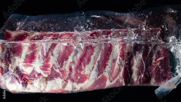 Fototapeta pork ribs in vacuum bag prepare to sous vide procees