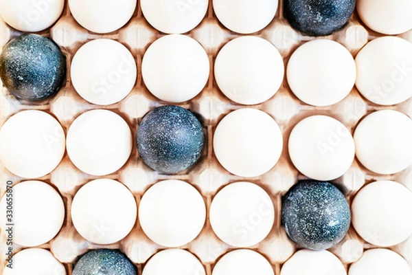 Fototapeta Easter eggs in a container.