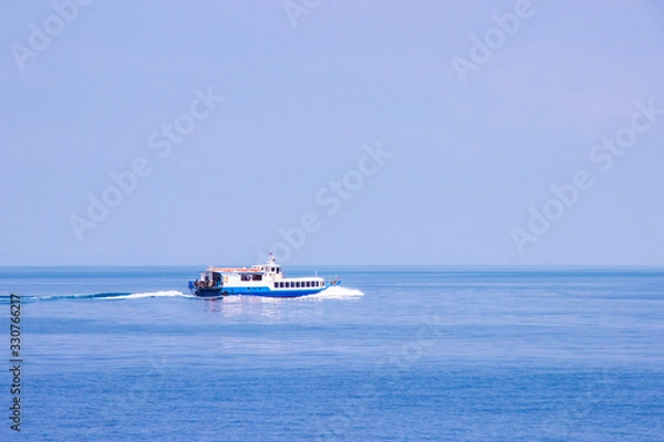 Obraz Service tourist high speed ferry boat go to koh kood and koh mak island in Trat province, Thailand.