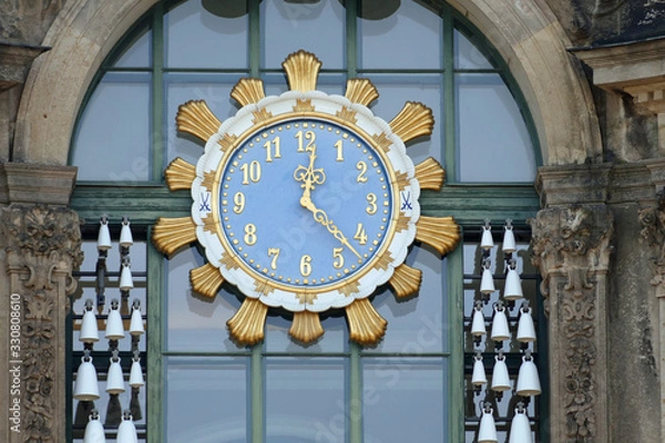 Fototapeta Close-up of the clock and the Meissen Porcellain bells of the Glockenspiel Pavillion at Sophien-Gate of the Zwinger in Dresden, Germany, Europe