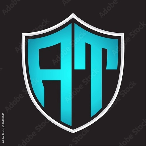 Fototapeta AT Logo monogram with shield shape isolated blue colors on outline design template