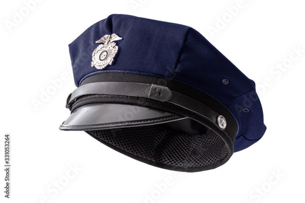 Fototapeta Protect and serve, law enforcement and american cop concept police officer hat isolated on white background with clipping path