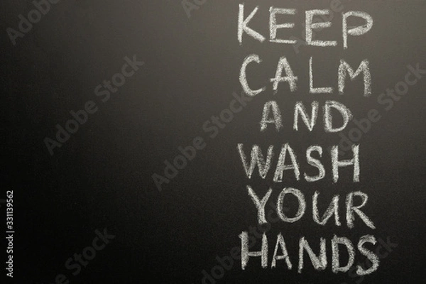 Fototapeta Chalk inscription on the blackboard - keep calm and wash your hands. Coronavirus and danger of getting sick. With space for inscription