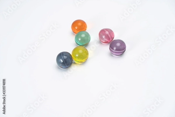 Fototapeta The colorful fragrant beads with all kinds of fragrance in the white background can make the air fresh and let the opposite sex like you, so that you can put it in the car or the room