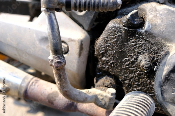 Obraz Motorcycle engine oil that has leaks