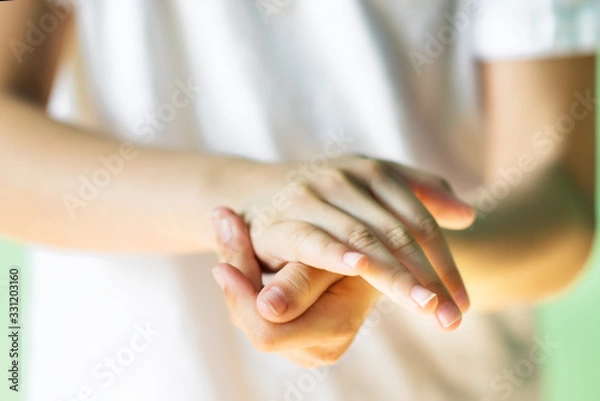 Fototapeta Closeup picture of hands during washing by antibacterial liquid. Hand disinfection with antiseptic. Prevention of coronavirus covid-2019 infection during pandemic. Health and medical care for humans.